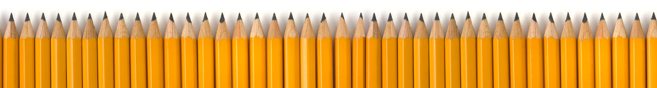 Subject: A row of yellow pencils against a white background, designed to be used as border for page layout, with space for text above.